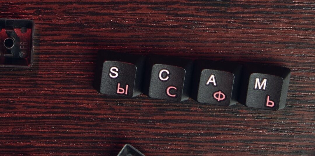 scam spelled out with keys